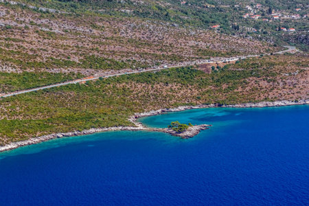 Croatian landscape near Dubrrovnik shot from helicopter with  small rocky beach.の写真素材