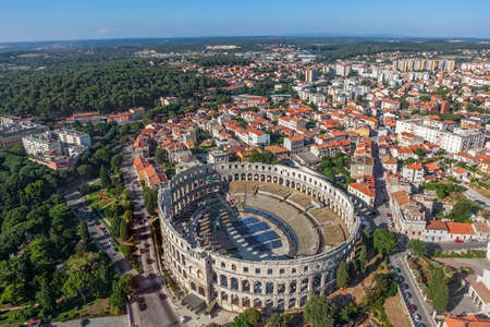 Aerial shoot of Arena ancient Roman amphitheater - Old town Pula, Istra region, Croatia.のeditorial素材