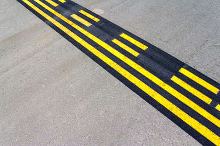 Airport start-stop lines on a runwayの写真素材