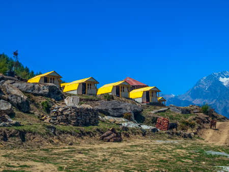 Mountain camp on sunrise in the Himalayas - Auli (ski destination), India.のeditorial素材