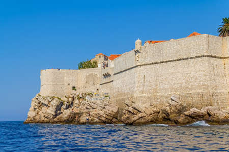 Dubrovnik old city defense walls details shot from a boat. Southern part. Location Croatia - Europe.のeditorial素材