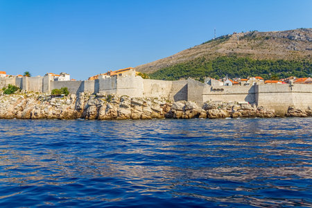 Dubrovnik old city defense walls details shot from a boat. Location Croatia - Europe.のeditorial素材