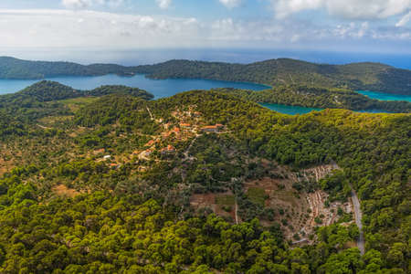 Aerial helicopter shoot of National park on island Mljet, Dubrovnik archipelago, Croatia. The oldest pine forest in Europe preserved.の写真素材