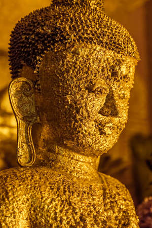BAGAN, MYANMAR - FEB 22: Small Buddha statues covered with gold flakes in Ananda Temple (Indian Style Structure) on Feb 22, 2012 in old Bagan, Myanmar. Built around 1105 by King Kyanzittha.のeditorial素材