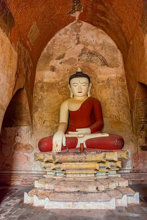 BAGAN, MYANMAR - FEBRUARY 23: Old renovated sculpture of a seated Buddha inside of Sulamani temple on February 23, 2013 in Bagan, Myanmar.のeditorial素材