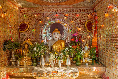 OLD BAGAN, MYANMAR - FEBRUARY 22: Buddha altar near Bupaya stupa on February 22, 2012 in Old Bagan, Myanmar. A popular place to pray.のeditorial素材
