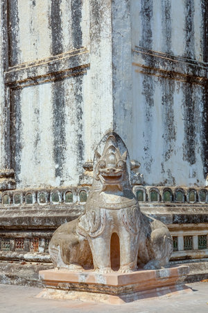 BAGAN, MYANMAR - FEBRUARY 23: Statues of the guardian Lion are positioned on every corner of ancient...