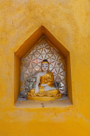 MOUNT POPA, MYANMAR - FEBRUARY 24: One of many small votive Buddha is a popular place for pray in...