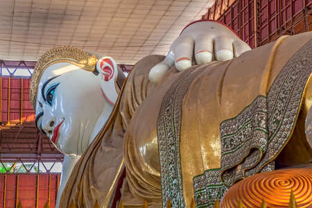 YANGON, MYANMAR - MAR 1: The giant reclining Buddha at Chaukhtatgyi temple on Mar 1, 2012 in Yangon, Myanmar. One of the biggest and most graceful Reclining Buddha statues in South East Asia.のeditorial素材