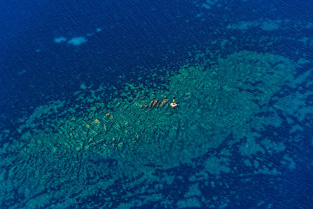 Aerial helicopter shoot of small lighthouse, Adriatic sea, Croatiaの写真素材