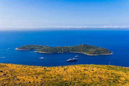 Aerial helicopter shoot of Adriatc landscape with Lokrum island (nature Park) and shoreline - Dubrovnik archipelago, Croatia.の写真素材