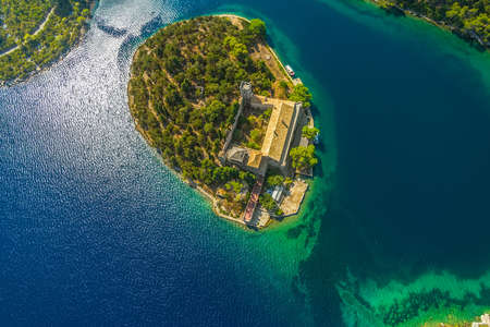 Aerial helicopter shoot of National park on island Mljet, Dubrovnik archipelago, Croatia  The oldest pine forest in Europe preserved and Monastery of Saint Mary on a small island in a big lake の写真素材
