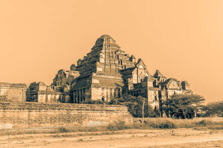 Dhammayangyi temple at sunset in sepia color.の写真素材
