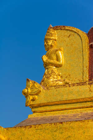 NZAUNG-U, MYANMAR - FEBRUARY 22: Golden freize decoration detail on the facade of Shwezigon Pagoda on February 22, 2013 in Nyaung-U, Myanmar. Shwezigon was built A.D 1076 as the most important reliquary shrine in Bagan.のeditorial素材
