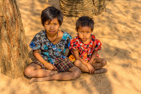 BAGAN, MYANMAR - FEBRUARY 24  Burmese children in a local village on February 24, 2013 in Bagan, Myanmar のeditorial素材