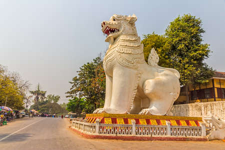 MANDALAY - FEBRUARY 25: Huge guardian lion at the southern stairways on February 25, 2013 in Mandalay, Myanmar.のeditorial素材