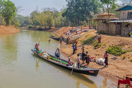 INDEIN, MYANMAR - FEBRUARY 28: Biggest village on Inle lake is place for trading goods brought by long motorized traditional boats on February 28, 2013 in Indein, Myanmar.のeditorial素材