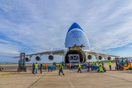 ZAGREB, CROATIA - NOVEMBER 10: Loading heavy weight cargo to the Antonov 225 Mriya airplane on...