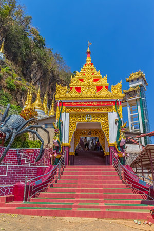 PINDAYA   MYANMAR - FEBRUARY 27 2013  Representation of the legend at the entrance pilgrimage caves where young Prince Kummabhaya killed giant spider to save seven princesses のeditorial素材