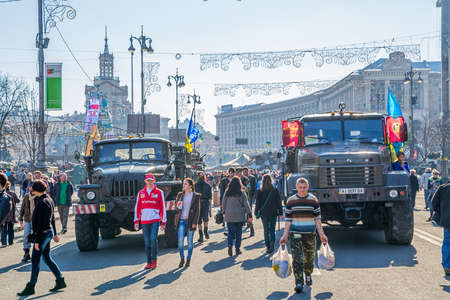 KIEV, UKRAINE - MARCH 22, 2014  People visiting Maidan square and barricades on the Khreshchatyk street, witch still stand because people distrust politicians and waiting for the Presidential elections のeditorial素材
