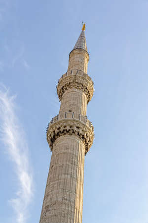 Blue mosque  minaret and sky on a sunny day, Istanbul Turkey. The biggest mosque in Istanbul of Sultan Ahmed (Ottoman Empire).の写真素材