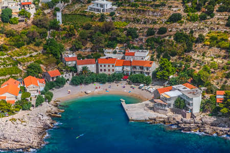 Small fishing village on the south part of the Peljesac peninsula with sandy beach in the center, in Dubrovnik archipelago, Croatia.の写真素材