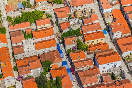 Aerial helicopter photo of medieval town Ston, just above the roofs at Peljesac peninsula near Dubrovnik, Croatia.の写真素材