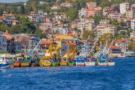 ISTANBUL, TURKEY - SEPTEMBER 28: Fishing boats moored in the small fishing harbor Sariyer.のeditorial素材