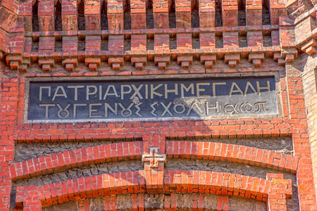 ISTANBUL, TURKEY - SEPTEMBER 28, 2013: The inscription above the entrance door of the Greek Orthodox College or Great School of the Nation in district Phanar.のeditorial素材