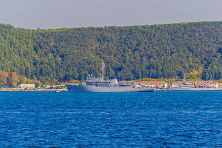 ISTANBUL, TURKEY - SEPTEMBER 29: TCG Cesme A599 battleship of Turkish army in the Bosphorus. Class survey ship transfered in 1999 from US army called USNS Silas Bent.のeditorial素材
