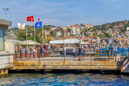 ISTANBUL, TURKEY - SEPTEMBER 29, 2013: View of the old dock in Yenikoy. Regular and tourist ship stop in Bosporus.のeditorial素材