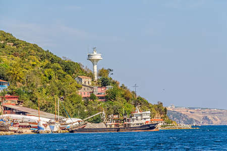 ISTANBUL, TURKEY - SEPTEMBER 29, 2013: View of the end of the northernmost district Sariyer, sailing Bosporus just before entrance to the Black Sea.のeditorial素材