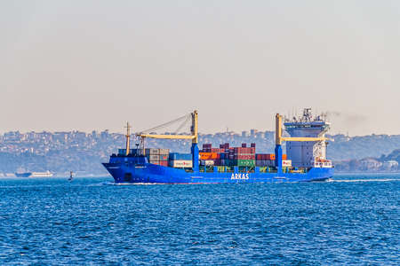 ISTANBUL, TURKEY - SEPTEMBER 29, 2013: Ship Arkas sails Bosphorus on sunny autumn day.のeditorial素材