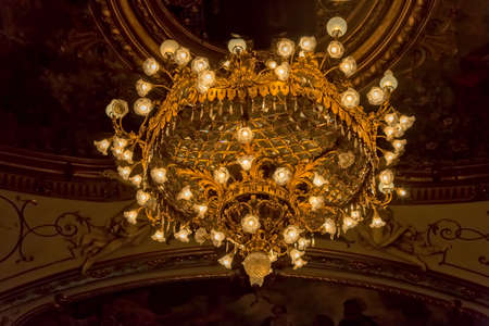 ZAGREB, CROATIA - October 14, 2014: Chandelier on the painted ceiling of the Croatian National Theatre a neo-baroque building, a masterpiece of architects Ferdinand Fellner and Hermann Helmerのeditorial素材