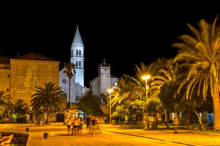 SUPETAR, CROATIA - July 23, 2014 People walking around the old town by the sea in the summer night on island Brac.のeditorial素材