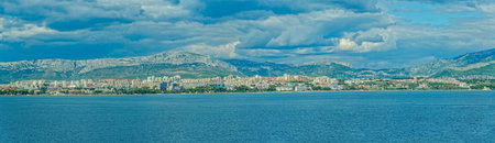 Residential area of the largest Dalmatian city Split, view from the Brac channel.