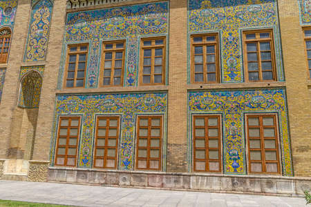 Patterned walls and wooden windows of the royal palace Golestan oldest groups of buildings in persian capital, was rebuilt to its current form in 1865. Tehran, Iran.のeditorial素材