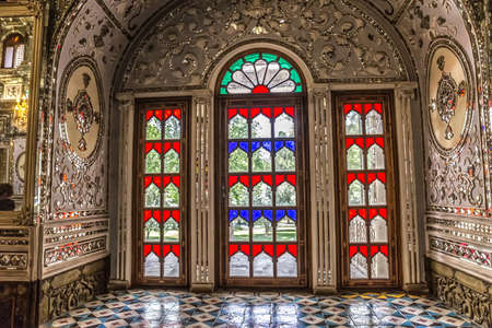 Colorfull windows decoration detail of interior of the Golestan Palace former royal Qajar complex in capital city. Tehran, Iran.のeditorial素材