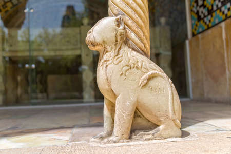 TEHRAN, IRAN - MAY 1, 2015: Lion on marble column base in Golestan Palace former royal Qajar complex in capital city.のeditorial素材