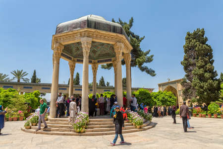 SHIRAZ, IRAN - MAY 2, 2015: Visitors take a tour of the tomb of Persian poet Hafez. Dome-like structure was erected in Shiraz near his grave at Golgast-e Mosalla in 1452のeditorial素材