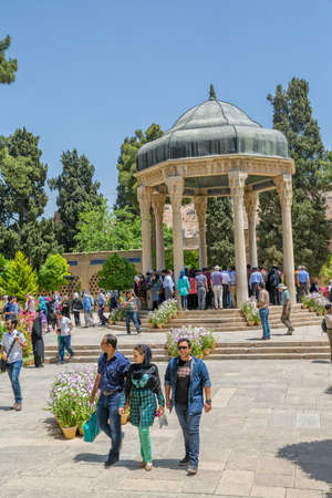SHIRAZ, IRAN - MAY 2, 2015: Visitors take a tour of the tomb of Persian poet Hafez. Dome-like structure was erected in Shiraz near his grave at Golgast-e Mosalla in 1452のeditorial素材