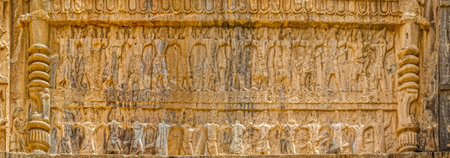 Royal tombs facade view of the carriers of the royal throne to his eternal resting place, ruins of old city Persepolis.の写真素材