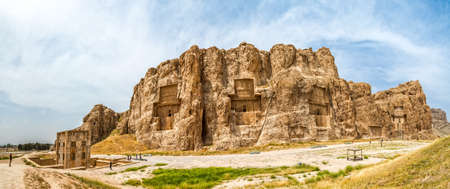 NAQSH-E RUSTAM, IRAN - MAY 3, 2015: The historical monuments of ancient necropolis near ruins of old city Persepolis.のeditorial素材