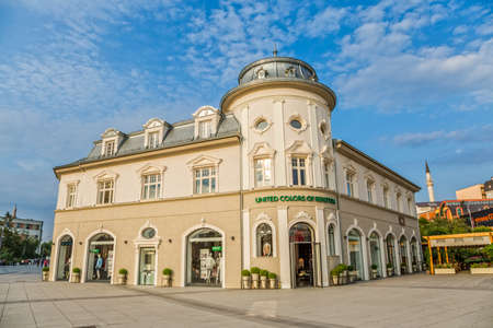 PRISTINA, KOSOVO - JULY 04, 2015: The old building renovated and converted into a shop on the Scanderbeg square in city center.のeditorial素材