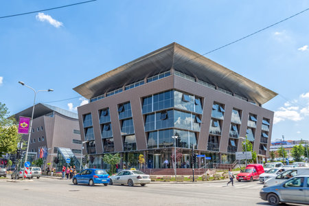 PRISTINA, KOSOVO - JULY 04, 2015: The building of the Ministry of Education built by architect Kadri Gega, on Agim Ramadani street in city center.のeditorial素材