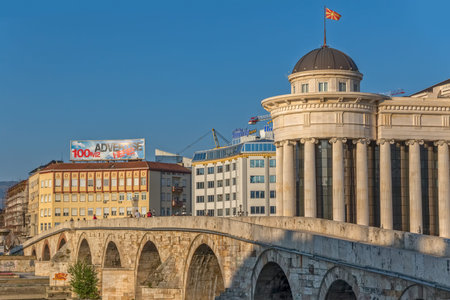SKOPJE, MACEDONIA - JULY 17, 2015: Capital city view by the old stone bridge.のeditorial素材