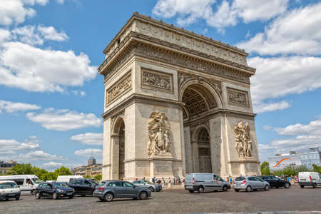 PARIS, FRANCE - JULY 9, 2015: The Arc de Triomphe in the city center is the famous monument that honors those who fought and died for France.のeditorial素材