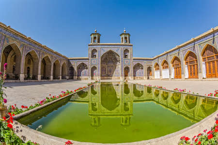 Fisheye view of the beautiful courtyard with pool of the Nasir al-Mulk Mosque is a traditional mosque located in Goad-e-Araban place in Shiraz.の素材 [FY31045281108]