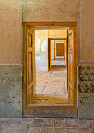 View of the old doors passage from inside of the old citadel Karmin Khan in the centre of the Shiraz city.の写真素材