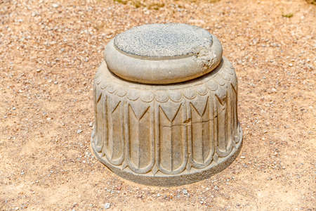 Ruins of old city Persepolis, a detail of a colum and Persian construction techniques in a capital of the Achaemenid Empire 550 - 330 BC.の写真素材